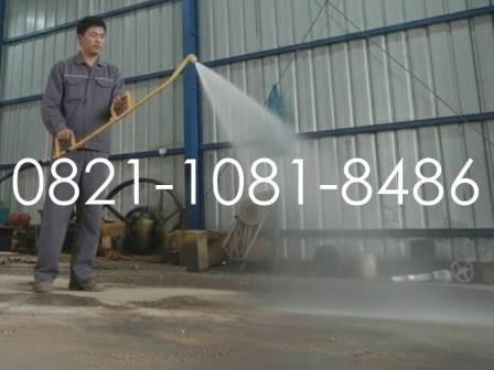 penyemprotan aspal menggunakan Hand Sprayer